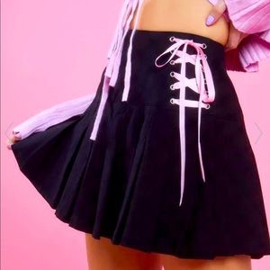 Sugar Thrillz dollskill black pleated mini skirt with pink ribbon corset lacing